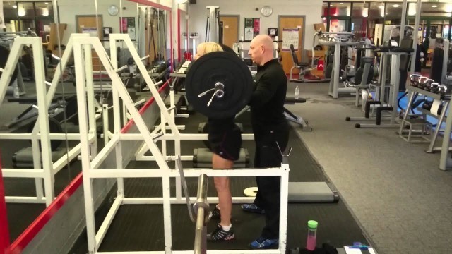 'Michelle White performing a 82.5Kg Olympic Squat.'