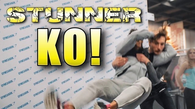 'FIBO POWER 2016: EPIC STONE COLD STUNNER KNOCK OUT! | Fitness Training Expo | Lex Fitness'