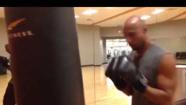 'Kickboxing on Punching Bag at Gym Cardio-LA Fitness'